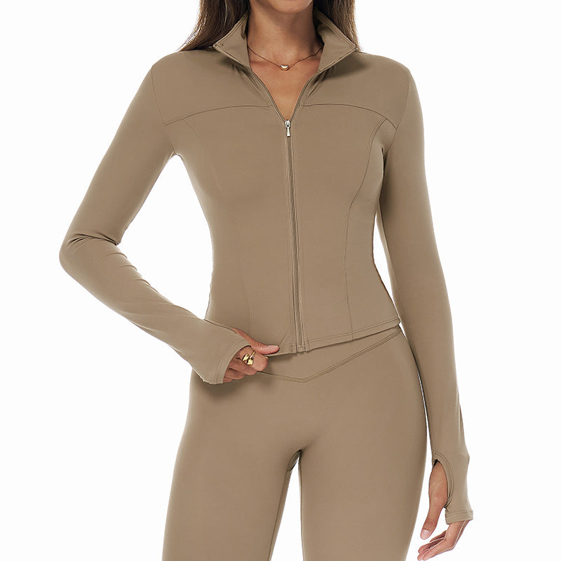 Autumn–winter quick‑dry zip jacket with a refined, sculpted silhouette and an elevated, sleek finish.