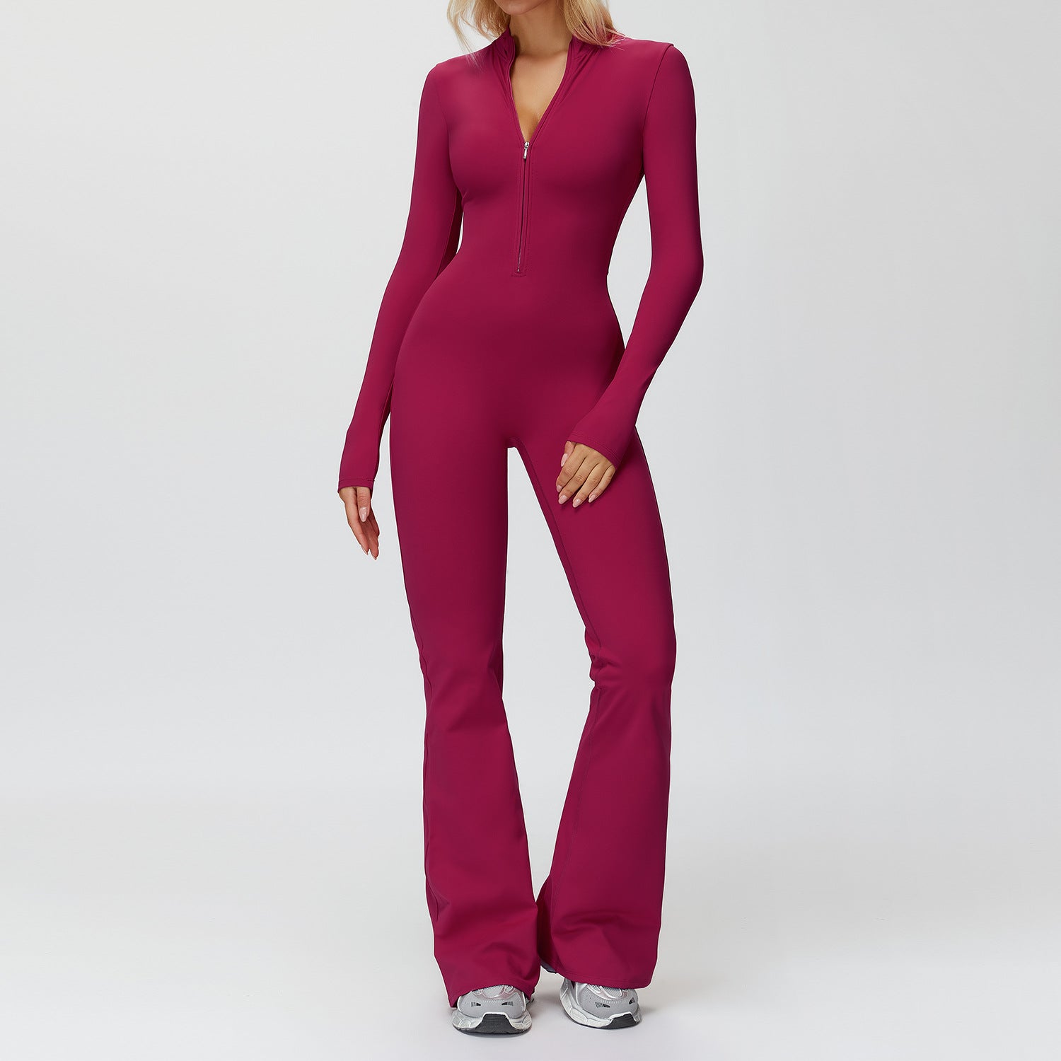 Autumn–winter fleece jumpsuit with a sleek, sculpted silhouette and an elevated wide‑leg finish.