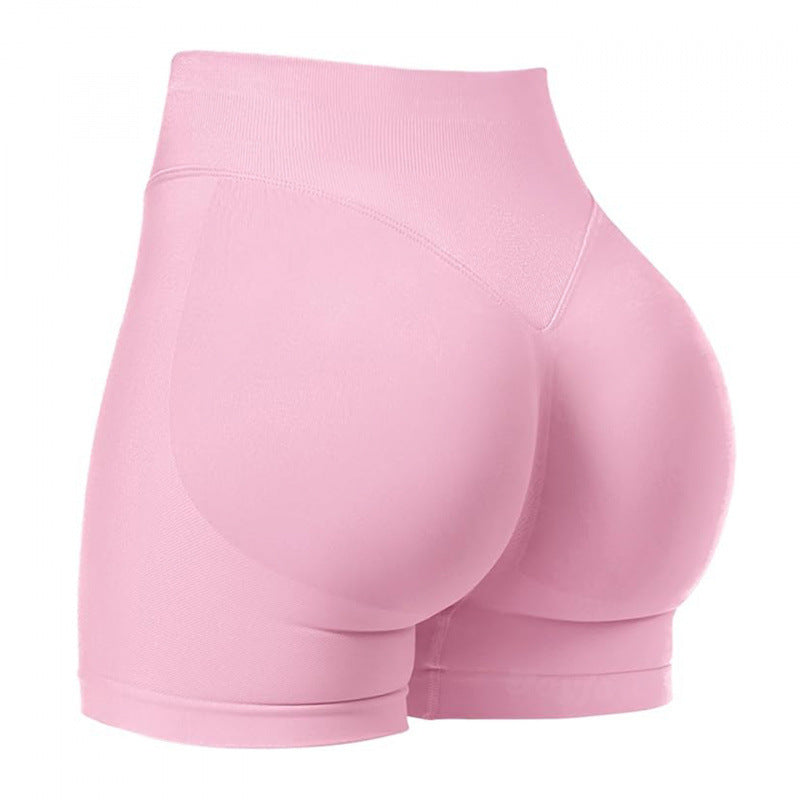 High‑waisted, seamless 3″ yoga shorts with a sculpted, peach‑lift fit and quick‑dry performance for running and training.