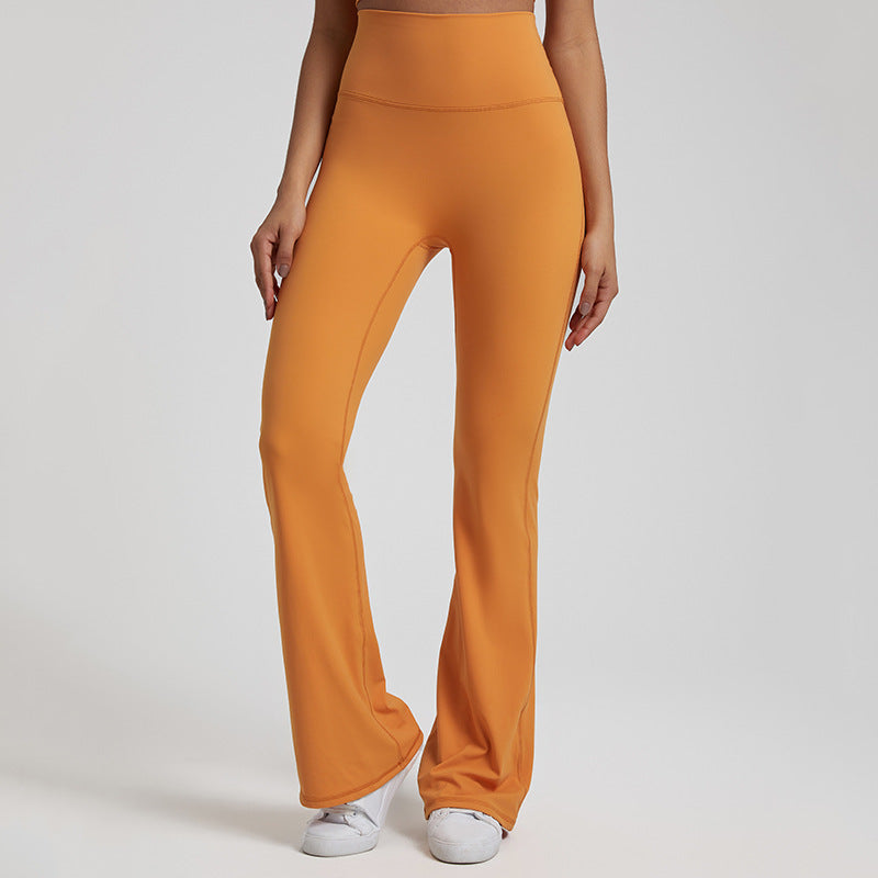 High‑waisted, sculpting wide‑leg yoga pants with a smooth, flared fit and a subtle peach‑lift silhouette.