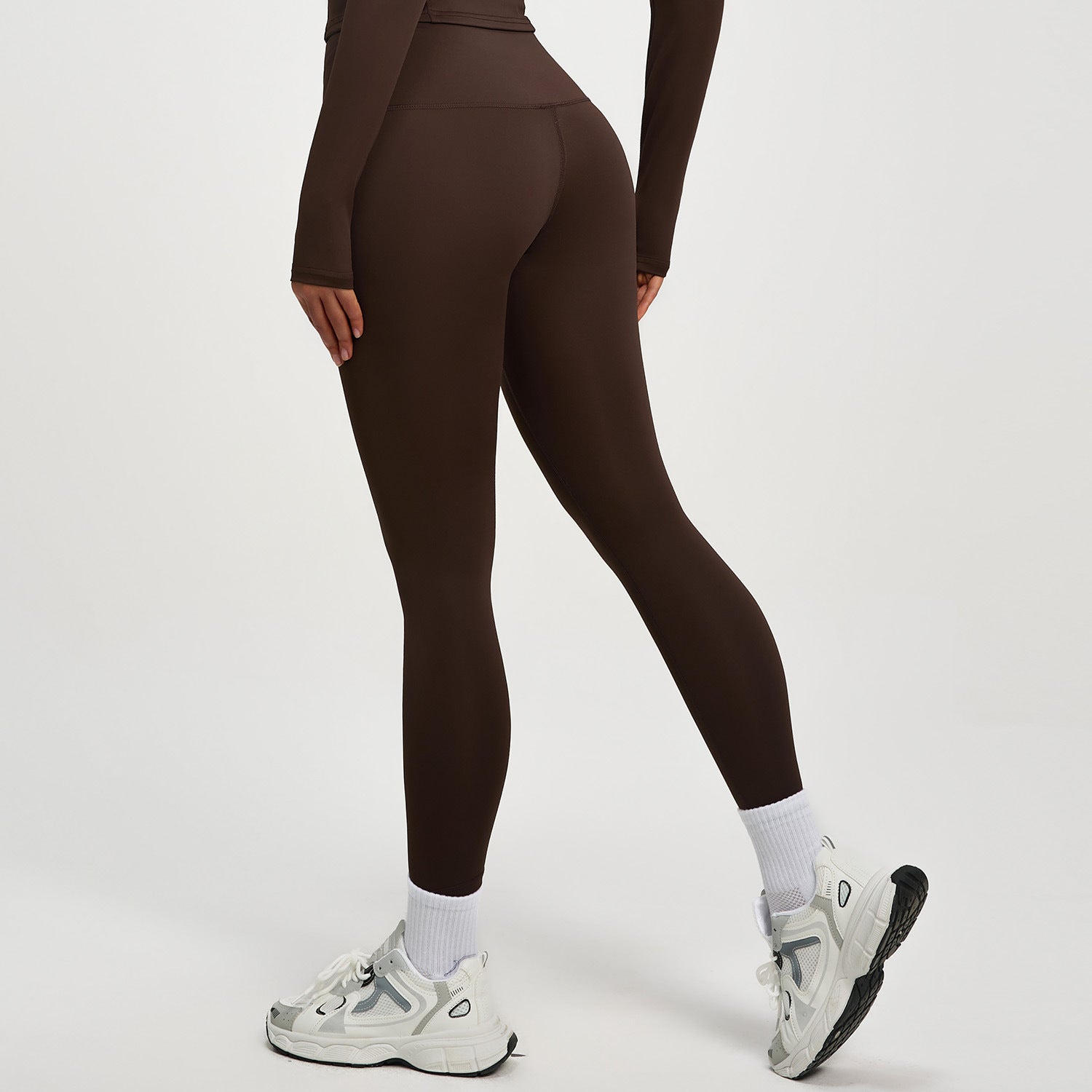 High‑waisted, no‑T‑line sculpting leggings with a sleek, elevated peach‑lift silhouette.