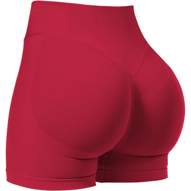 High‑waisted, seamless 3″ yoga shorts with a sculpted, peach‑lift fit and quick‑dry performance for running and training.