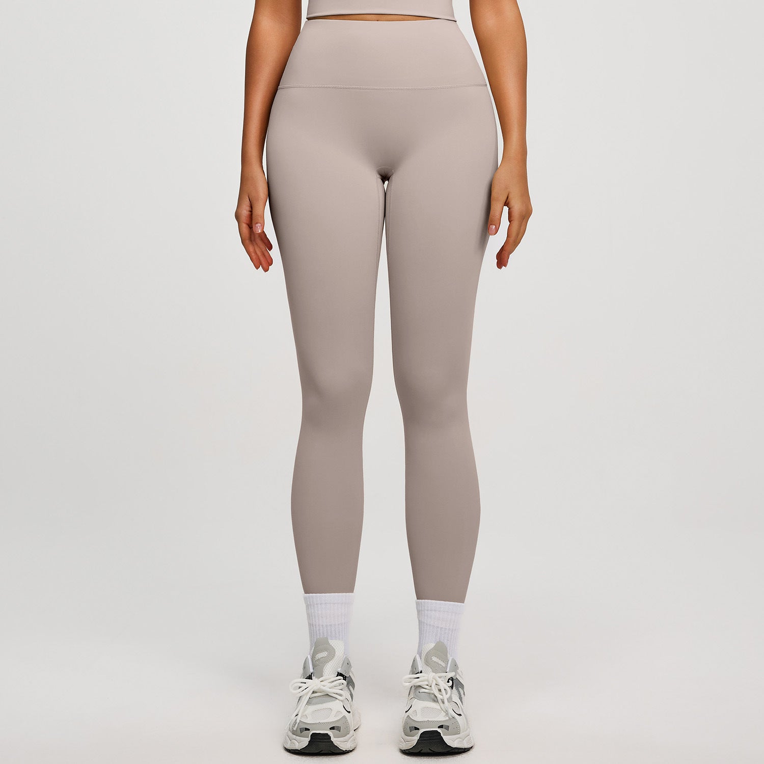 High‑waisted, no‑T‑line sculpting leggings with a sleek, elevated peach‑lift silhouette.