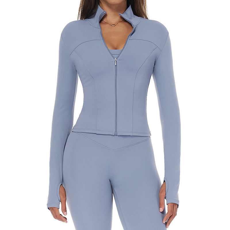 Autumn–winter quick‑dry zip jacket with a refined, sculpted silhouette and an elevated, sleek finish.