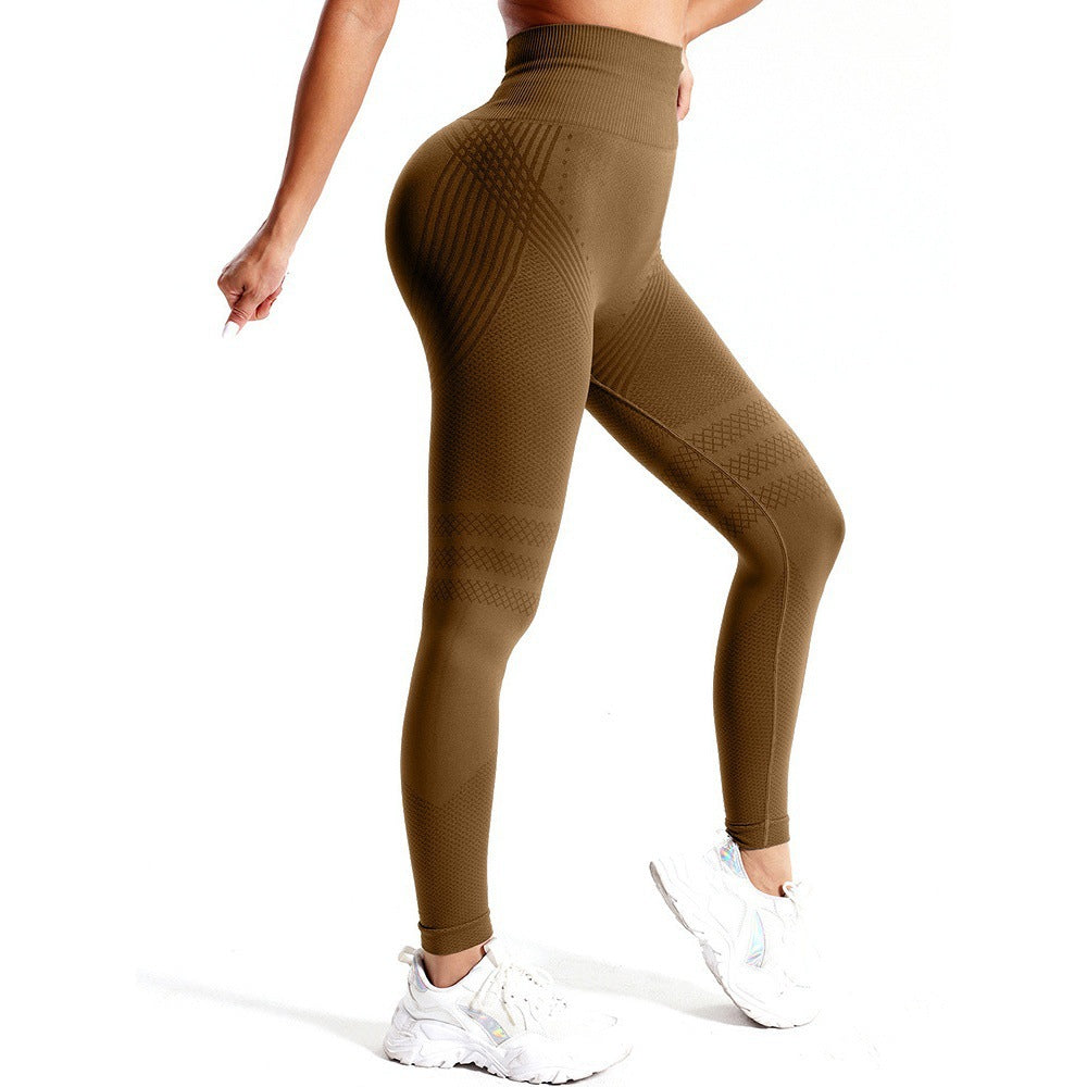 Seamless high‑waisted sculpting leggings with a sleek quick‑dry finish and an elevated peach‑lift contour.