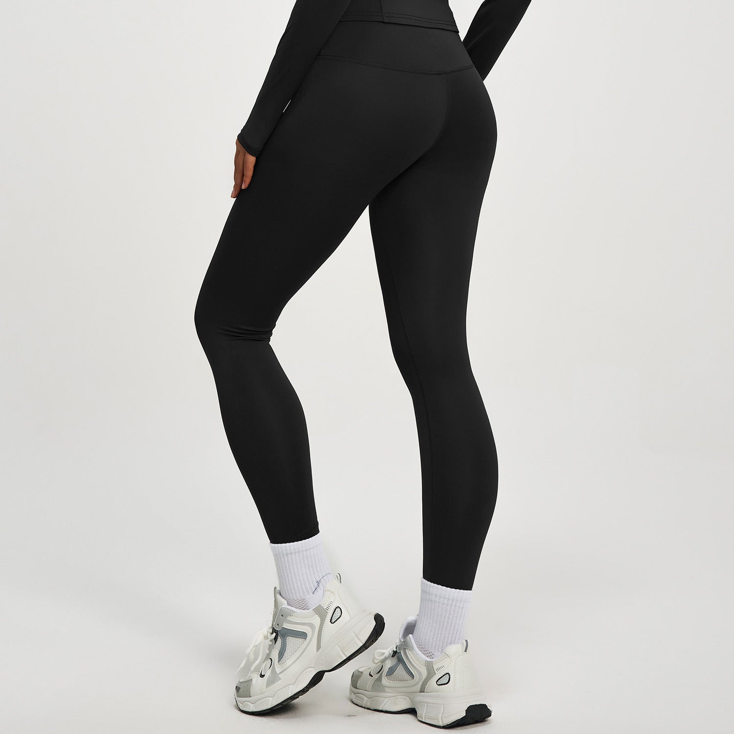 High‑waisted, no‑T‑line sculpting leggings with a sleek, elevated peach‑lift silhouette.