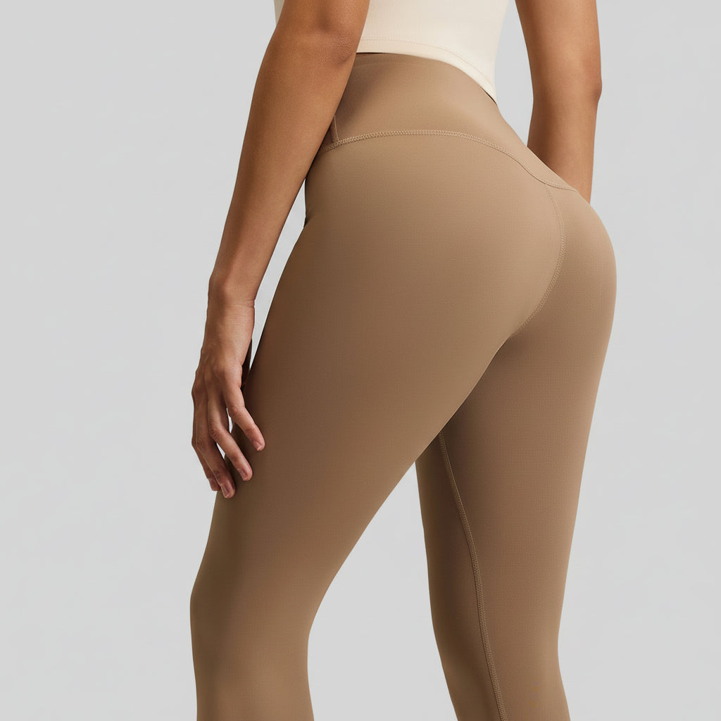 High‑waisted, no‑T‑line sculpting leggings with a sleek, elevated peach‑lift silhouette.
