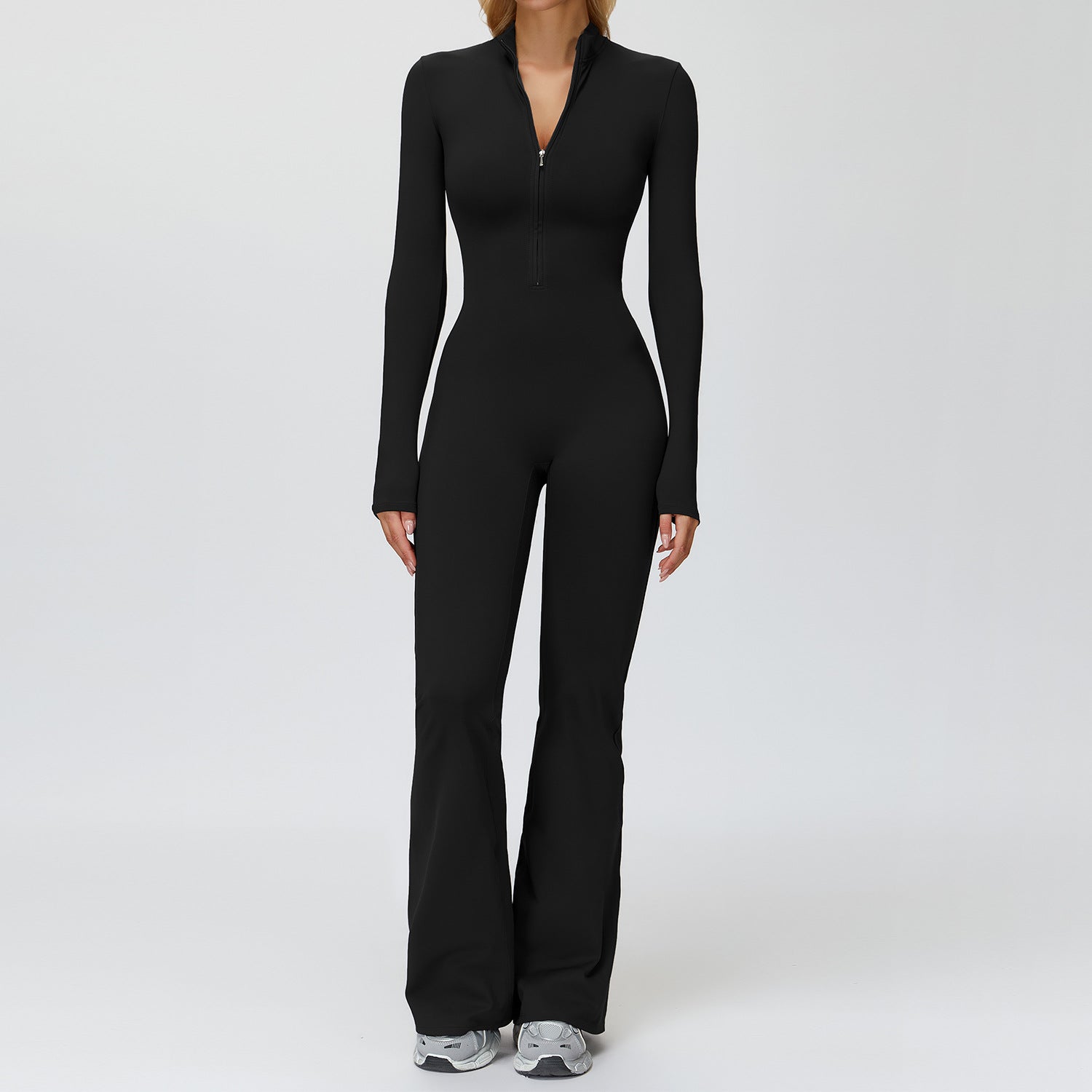 Autumn–winter fleece jumpsuit with a sleek, sculpted silhouette and an elevated wide‑leg finish.