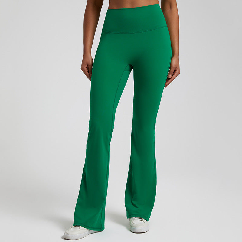 High‑waisted, sculpting wide‑leg yoga pants with a smooth, flared fit and a subtle peach‑lift silhouette.