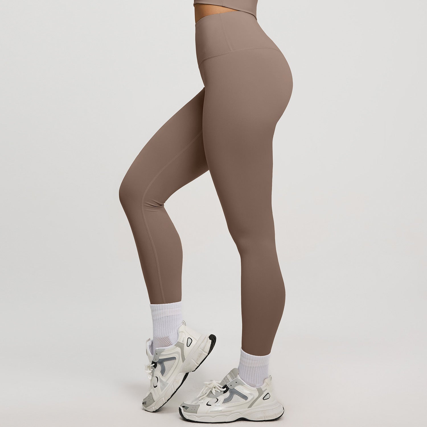 High‑waisted, no‑T‑line sculpting leggings with a sleek, elevated peach‑lift silhouette.