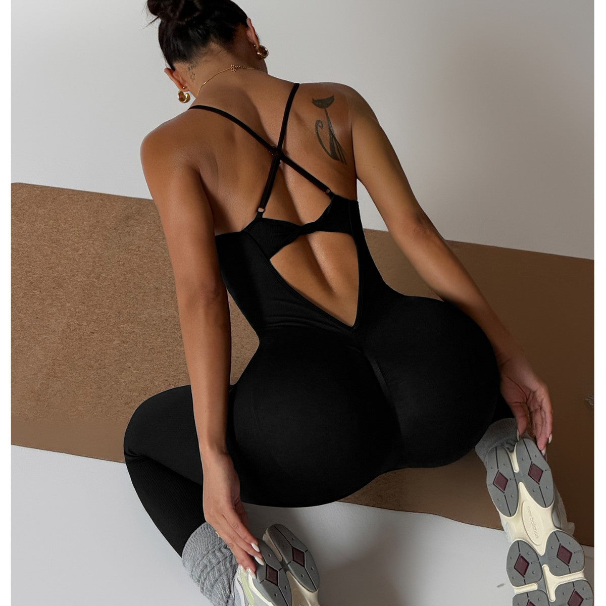 Autumn–winter quick‑dry sculpting one‑piece with a sleek, tight fit, lifted contour, and an elegant open‑back silhouette.