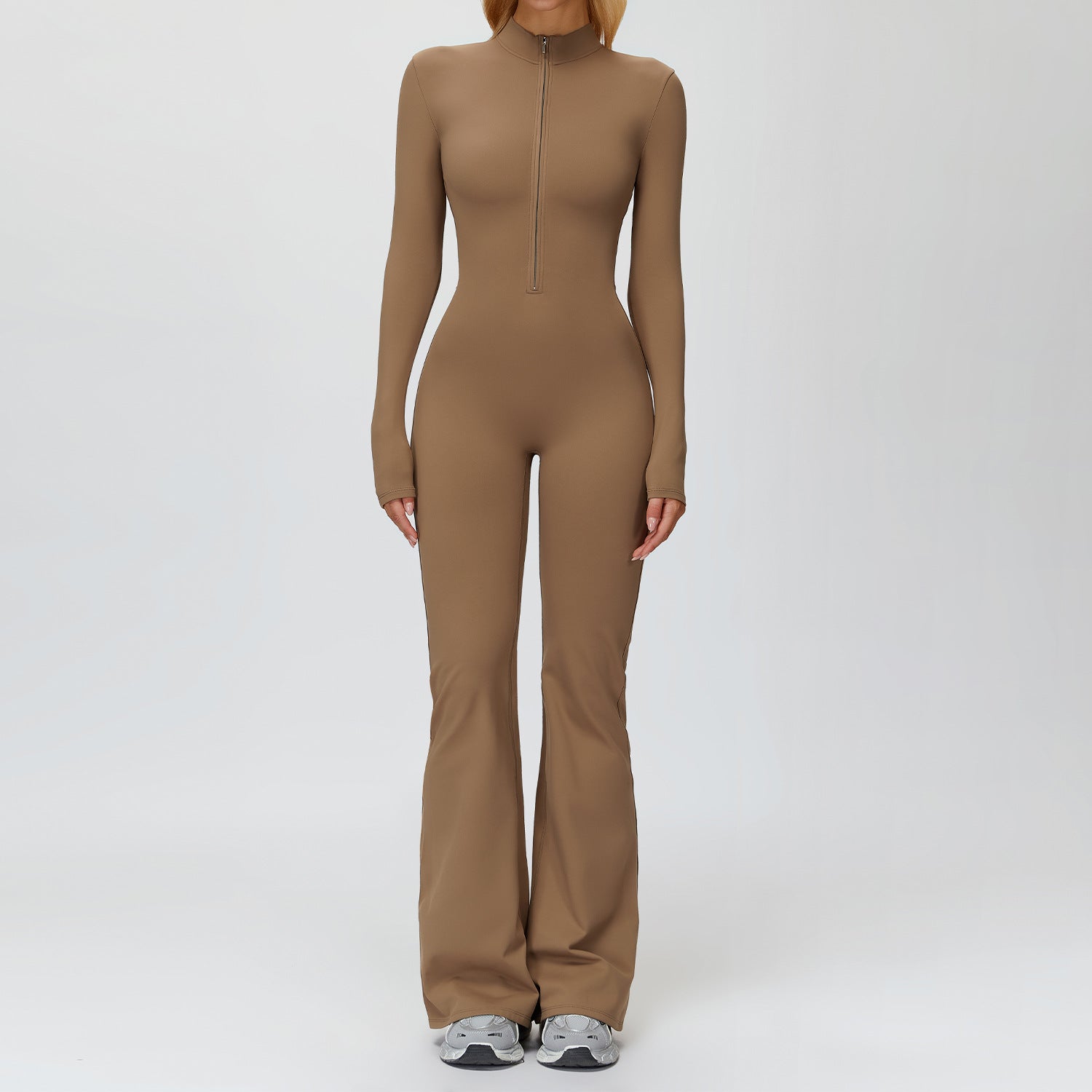 Autumn–winter fleece jumpsuit with a sleek, sculpted silhouette and an elevated wide‑leg finish.