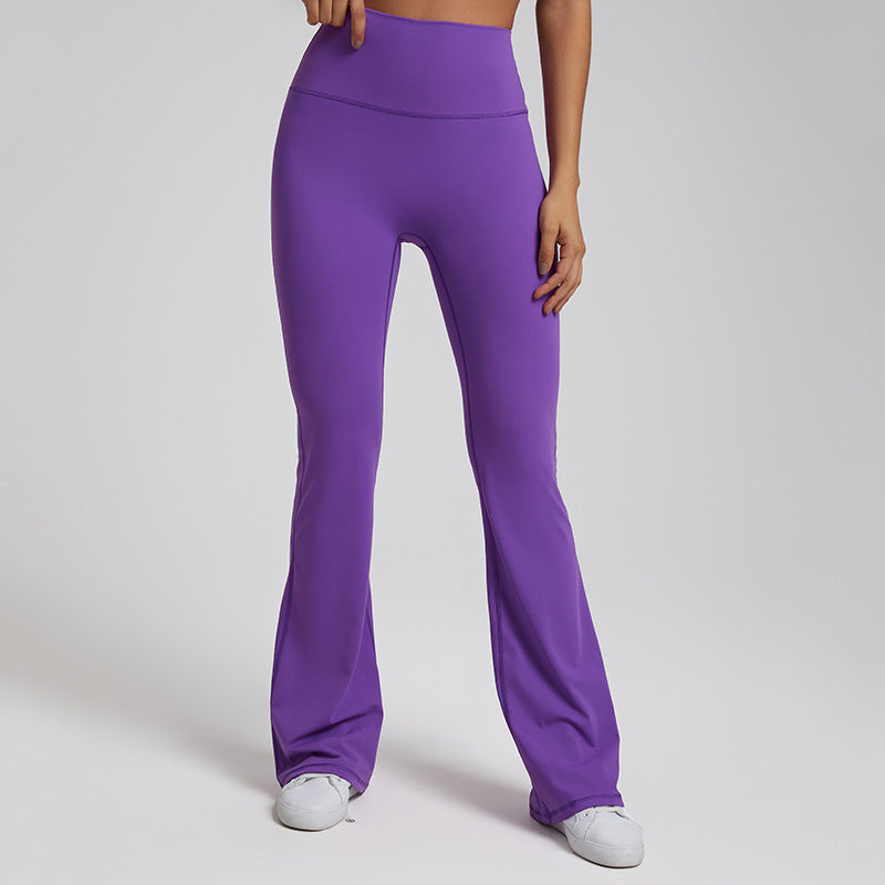 High‑waisted, sculpting wide‑leg yoga pants with a smooth, flared fit and a subtle peach‑lift silhouette.