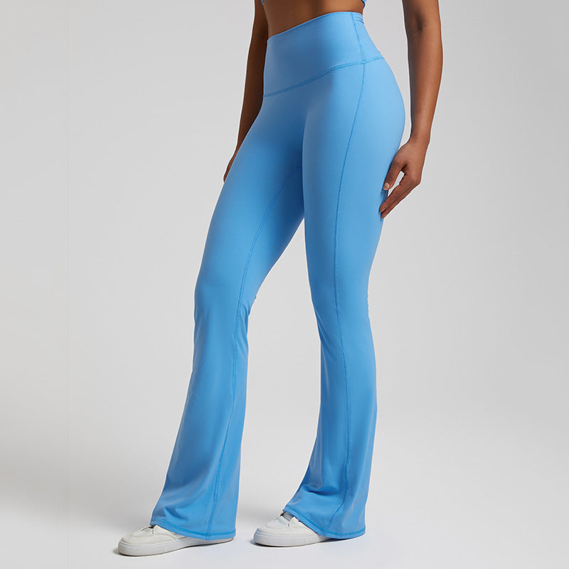 High‑waisted, sculpting wide‑leg yoga pants with a smooth, flared fit and a subtle peach‑lift silhouette.
