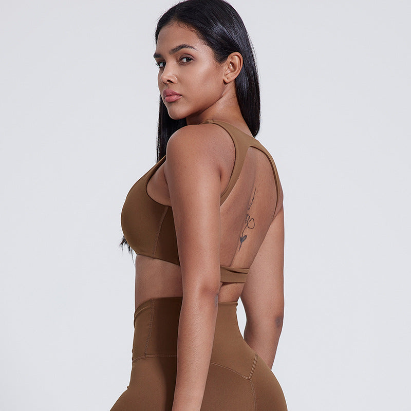 Shock‑support training bra with a sleek, sculpting fit and elevated no‑sag stability for running, yoga, and Pilates.