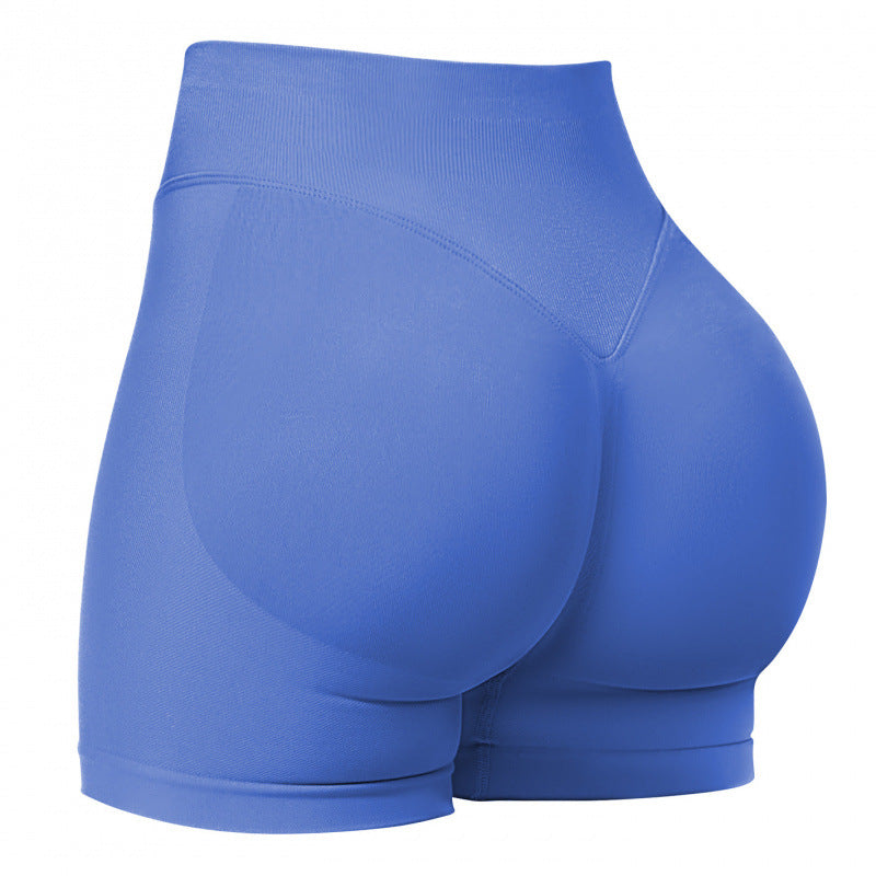 High‑waisted, seamless 3″ yoga shorts with a sculpted, peach‑lift fit and quick‑dry performance for running and training.