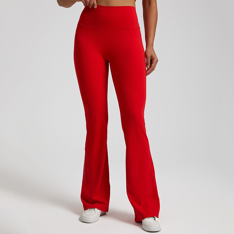 High‑waisted, sculpting wide‑leg yoga pants with a smooth, flared fit and a subtle peach‑lift silhouette.