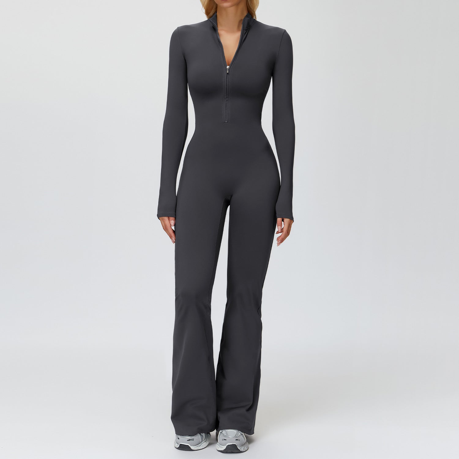 Autumn–winter fleece jumpsuit with a sleek, sculpted silhouette and an elevated wide‑leg finish.