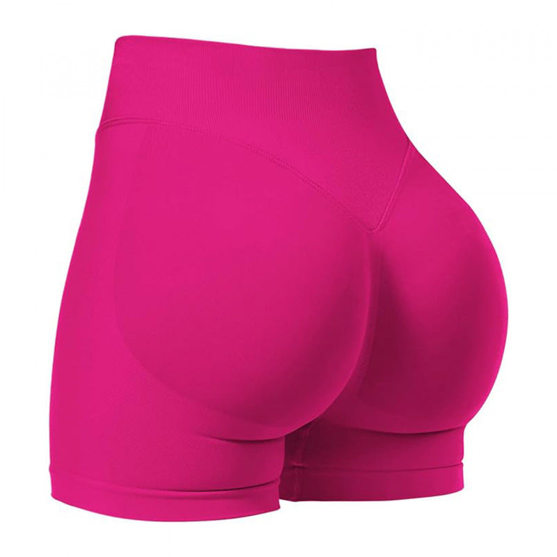 High‑waisted, seamless 3″ yoga shorts with a sculpted, peach‑lift fit and quick‑dry performance for running and training.