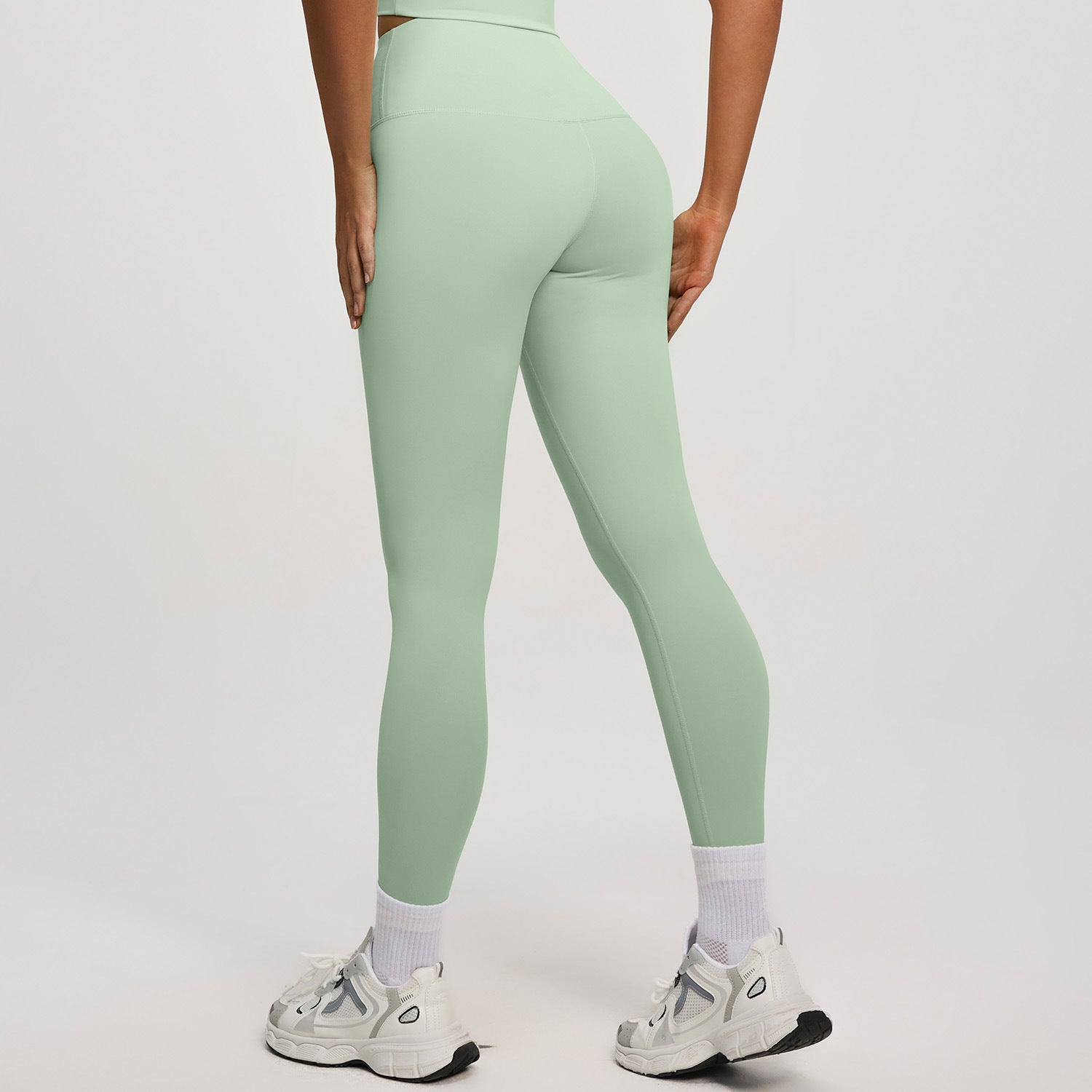 High‑waisted, no‑T‑line sculpting leggings with a sleek, elevated peach‑lift silhouette.