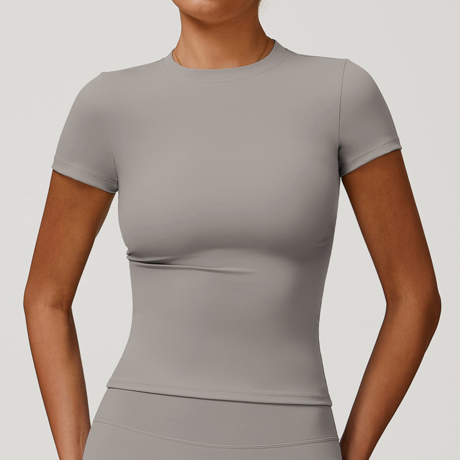 Ultra‑light, quick‑dry performance tee designed for the modern, movement‑driven woman