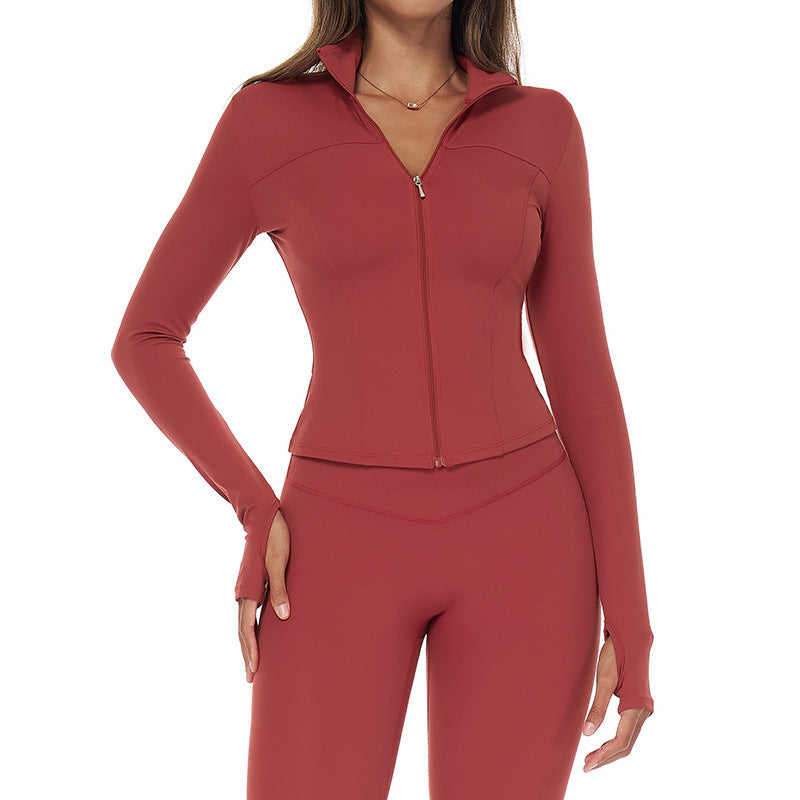 Autumn–winter quick‑dry zip jacket with a refined, sculpted silhouette and an elevated, sleek finish.