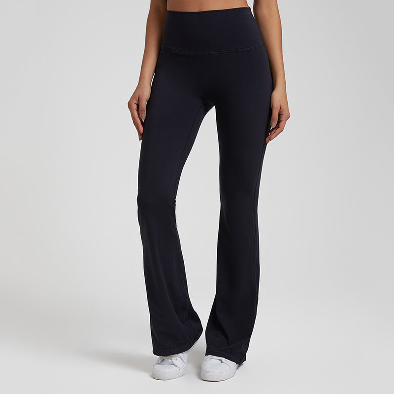 High‑waisted, sculpting wide‑leg yoga pants with a smooth, flared fit and a subtle peach‑lift silhouette.